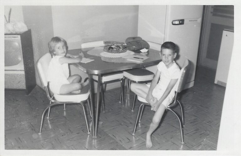 Sitting at a metal table
